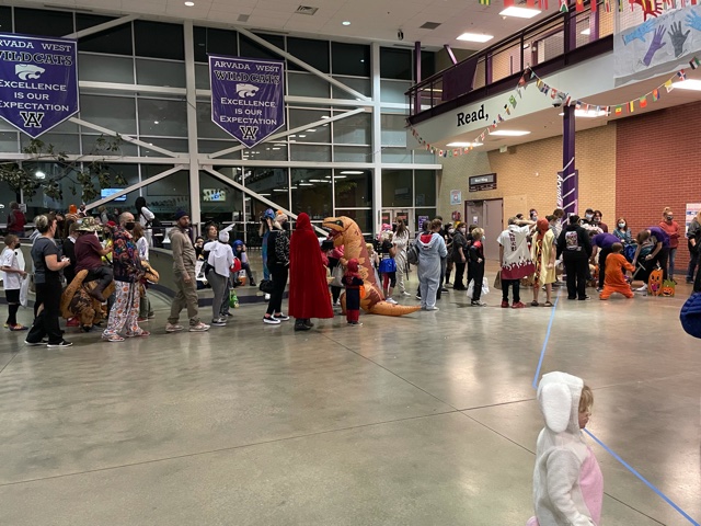 Numerous kids lined up for candy and fun during trick or treat streat. More people than expected showed up to this fantastic event. (Photo courtesy of Riley Swanson)