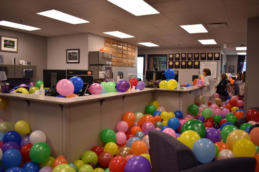 The+main+office%2C+filled+with+balloons+as+the+class+of+2022s+senior+prank.+Photo+taken+by+Jessica+Hickey