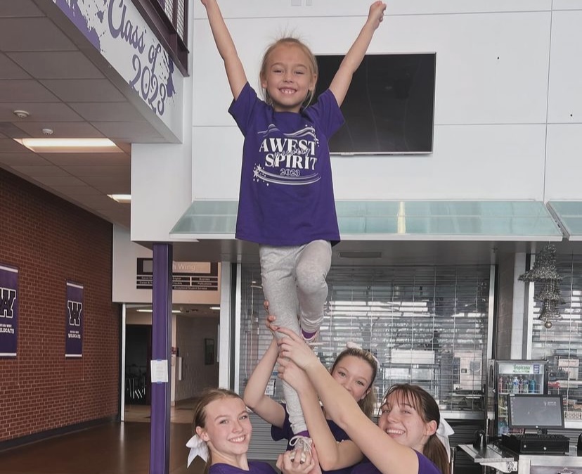 An image of Cheer stunting during the Peewee camp- Courtesy of Arvada West Cheer Instagram