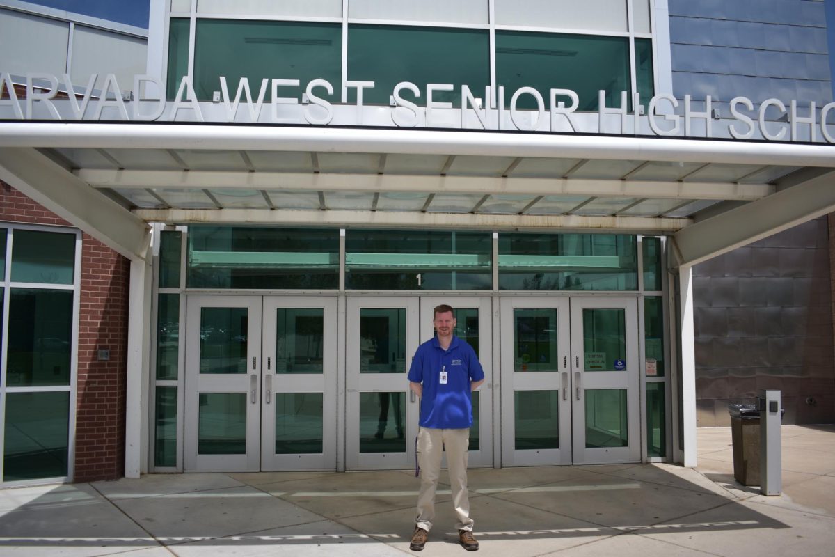 Brendan Cullen at the Arvada West main entrance, where he often operates from the security desk (Photo taken by Madeus Frandina)