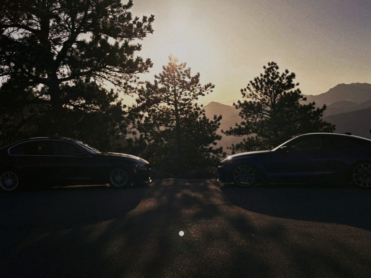 EV and Gas car taken together from a car meet
